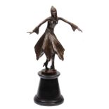 A CONTEMPORARY BRONZE SCULPTURE OF AN ART DECO STYLE DANCING GIRL with beaded cap and cuffs and