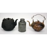 AN ANTIQUE JAPANESE TETSUBIN CAST IRON KETTLE, 17cm in height together with an antique copper kettle