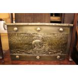 AN OLD BRASS COVERED COAL OR LOG BOX with embossed decoration of a ship in full sail to the front