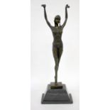 A CONTEMPORARY BRONZE SCULPTURE OF AN ART DECO STYLE DANCING GIRL with both hands raised, the bronze