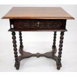 A 17TH CENTURY OAK SIDE TABLE with carved scrolling acanthus leaf decoration to the frieze drawer