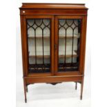 AN EDWARDIAN MAHOGANY DISPLAY CABINET with satinwood banding and ebony and boxwood stringing with