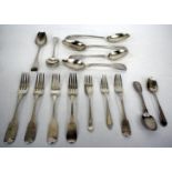 A COLLECTION OF ANTIQUE AND LATER SILVER CUTLERY to include a Georgian silver table spoon with marks