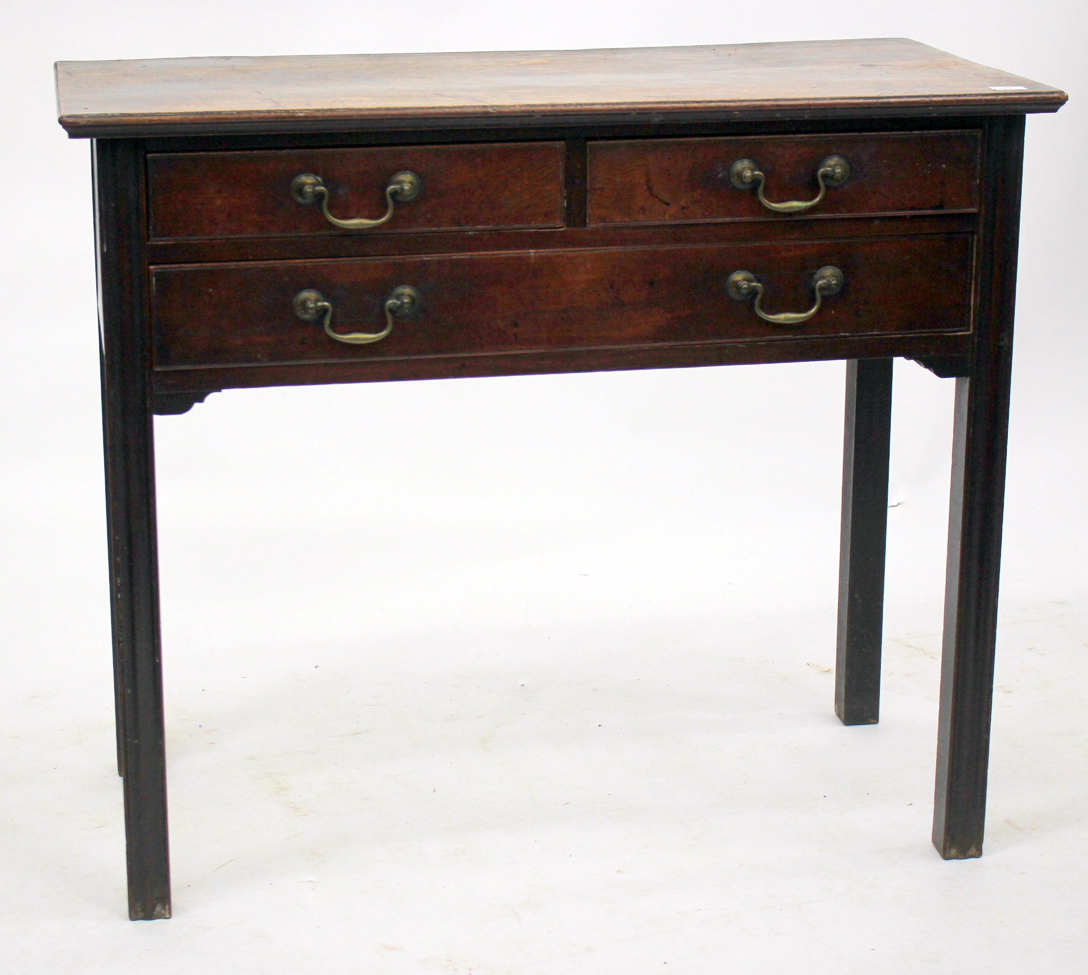 A GEORGE III MAHOGANY SIDE TABLE with two short drawers and one long drawer, all with brass swan