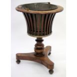 A 19TH CENTURY WALNUT AND TOLEWARE JARDINIERE with pierced slatted sides, a turned  stem and a