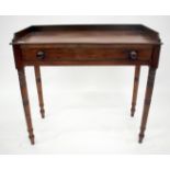 AN EARLY 19TH CENTURY MAHOGANY SIDE TABLE with a galleried top, a single frieze drawer with turned
