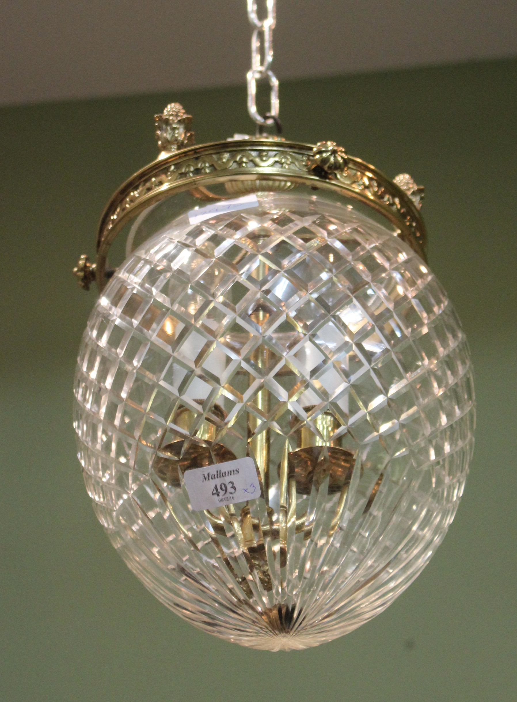 A BRASS AND CUT GLASS HANGING CEILING LIGHT approximately 20cm diameter together with a pair of gilt