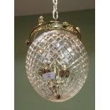 A BRASS AND CUT GLASS HANGING CEILING LIGHT approximately 20cm diameter together with a pair of gilt