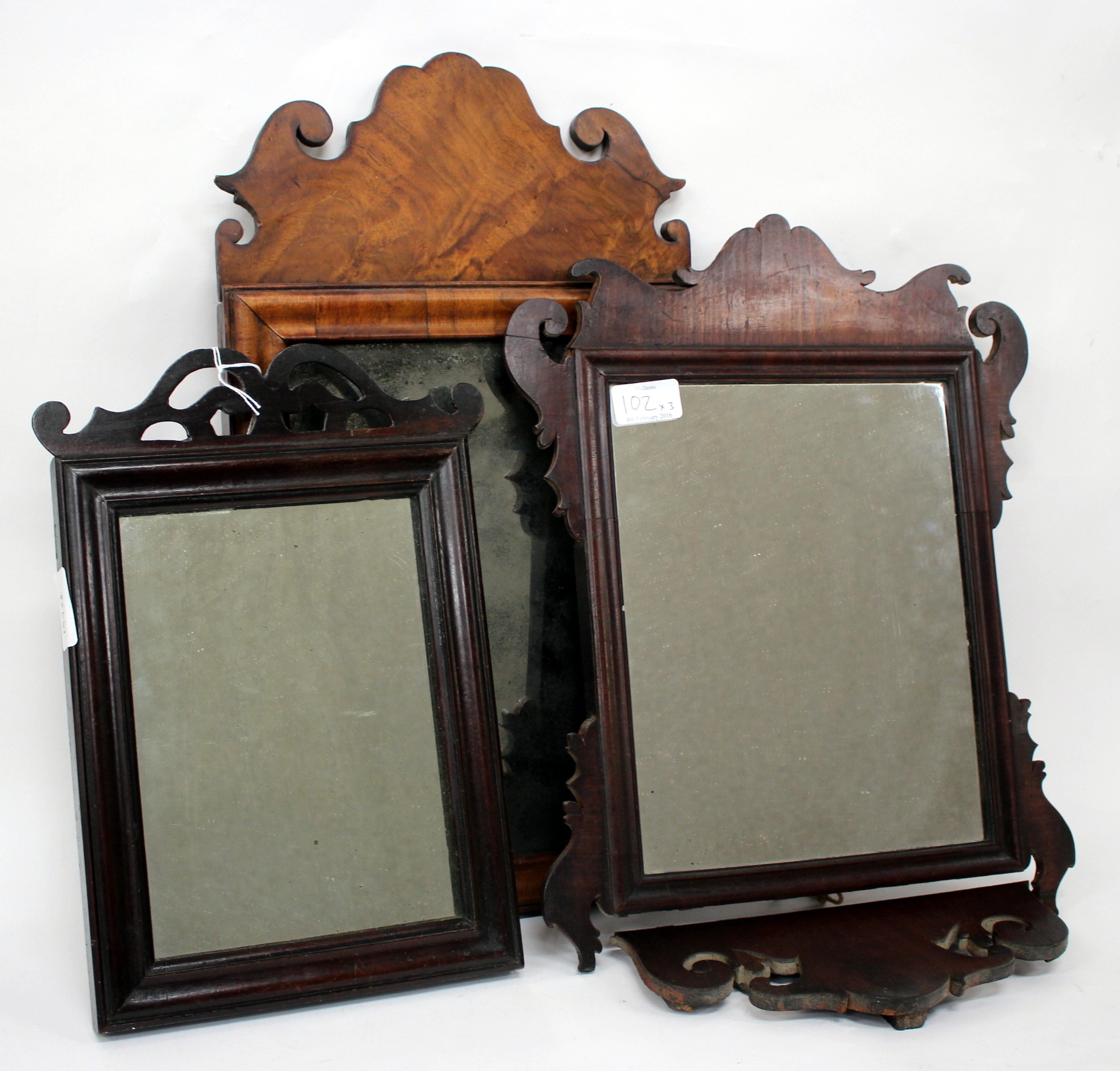 AN 18TH CENTURY WALNUT FRET FRAMED WALL MIRROR 27cm x 47cm together with two further small fret