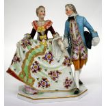 A LATE 19TH CENTURY SITZENDORF PORCELAIN FIGURAL GROUP of a dancing couple, 15cm in height