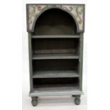 A GREEN AND GREY PAINTED BOOKSHELF with three fixed shelves, on ball feet, 68cm wide