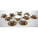 A ROYAL CROWN DERBY JAPAN PATTERN COFFEE SET comprising eight cups, eight saucers, cream jug and