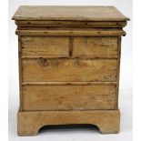 AN EARLY 19TH CENTURY PINE BOX with a lifting lid and bracket feet 48cm wide
