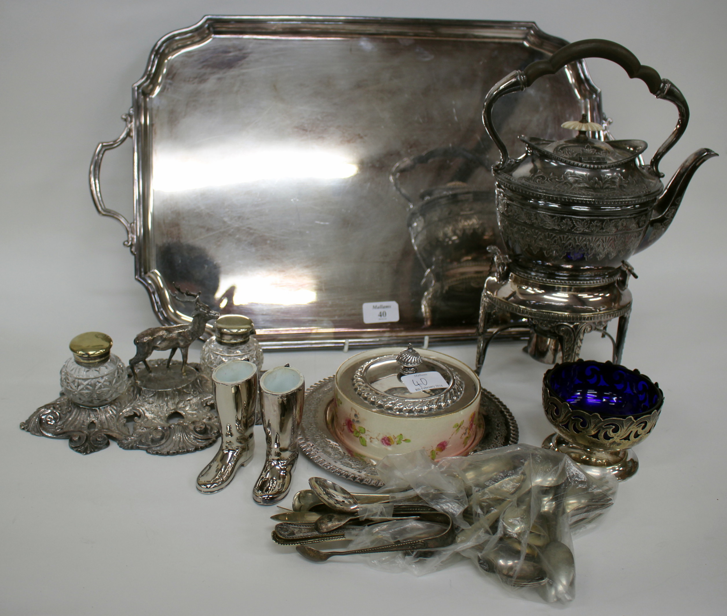 A VICTORIAN SILVER PLATED INK STAND with a central stag and pierced scrolling edges 25cm wide, a