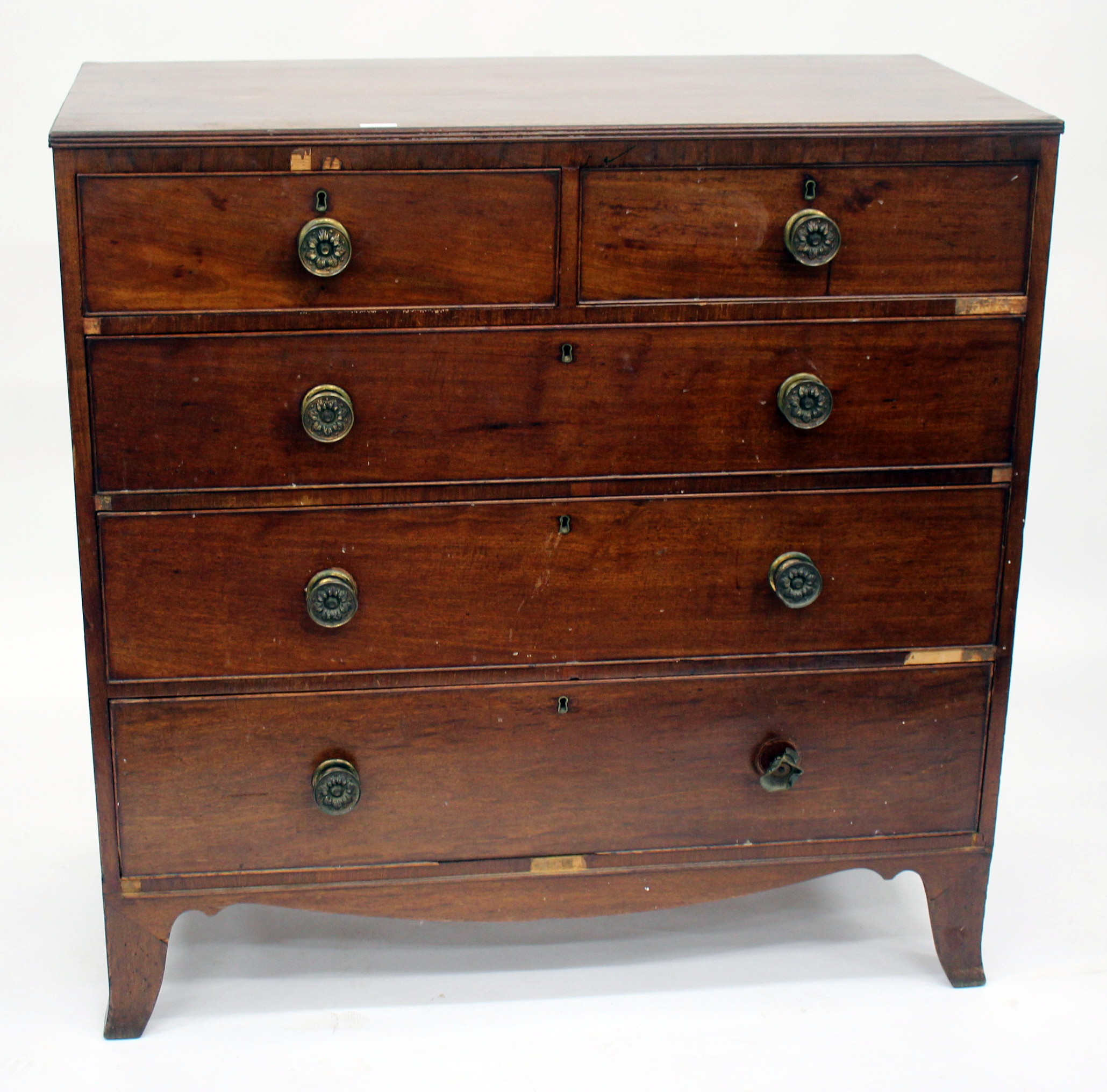 A VICTORIAN MAHOGANY CHEST of two short and three long drawers, having brass handles and splayed