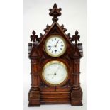 AN ANTIQUE OAK CASED MANTLE CLOCK AND BAROMETER, two circular dials, overall 28cm wide x 49cm high
