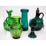 A MARY GREGORY STYLE GREEN GLASS EWER painted with snowdrops and with clear glass loop handle,
