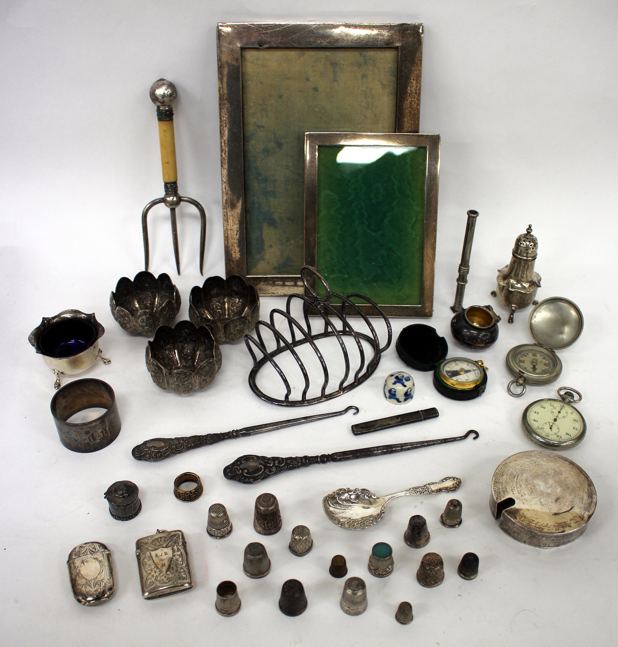 MISCELLANEOUS SILVER ITEMS to include three eastern white metal salts each 6cm diameter, a