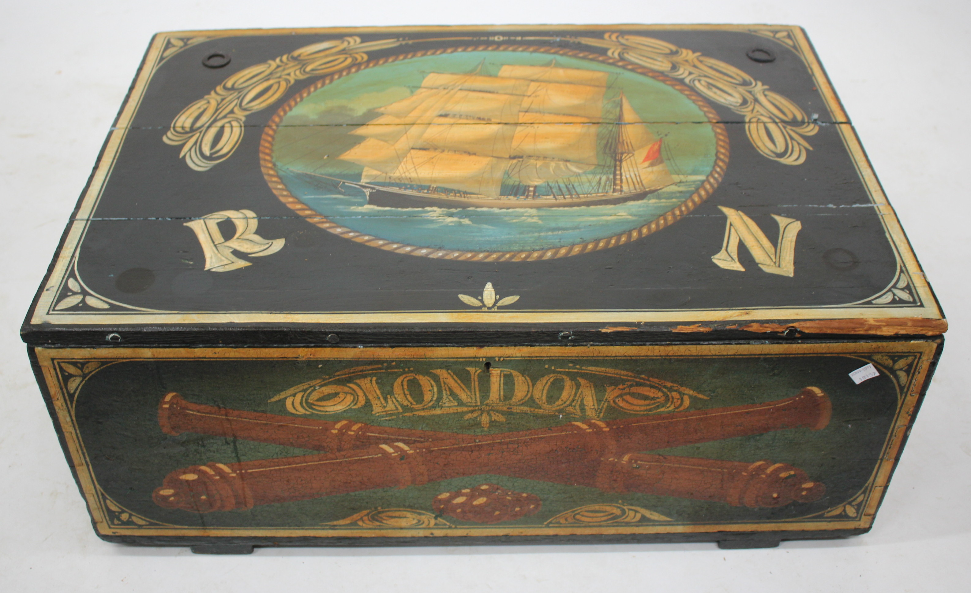 A PAINTED PINE TRUNK, painted with an oval scene of a two masted ship, 84cm x 58cm