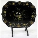 A VICTORIAN B. WALTON & CO. PAPIER MACHE TRAY TOP FOLDING TABLE the shaped top with mother of