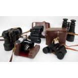 A PAIR OF 19TH CENTURY FRENCH BINOCULARS in a fitted case, a pair of Telstar binoculars, a pair of