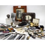 MISCELLANEOUS ITEMS to include a silver topped cut glass bottle, a maplewood picture frame, a silver