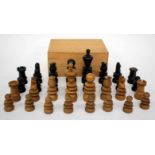 AN OLD TURNED WOODEN CHESS SET, possibly Indian, the king 10.5cm high
