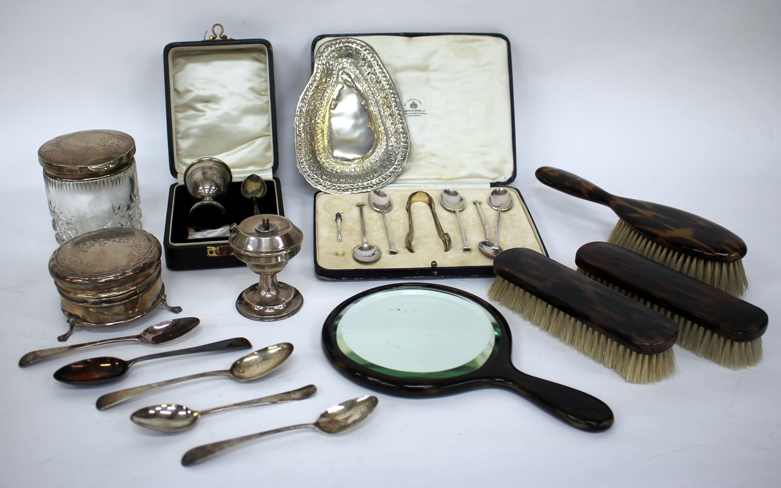 MISCELLANEOUS SILVER TO INCLUDE a part set of cased coffee spoons and tongs,a  silver table lighter,