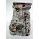 AN ANTIQUE TIN GLAZED TERRACOTTA ARCHITECTURAL ELEMENT with moulded scrolling decoration and
