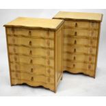 A PAIR OF 20TH CENTURY SERPENTINE FRONTED PAINTED CHESTS of six long drawers, each 64cm wide