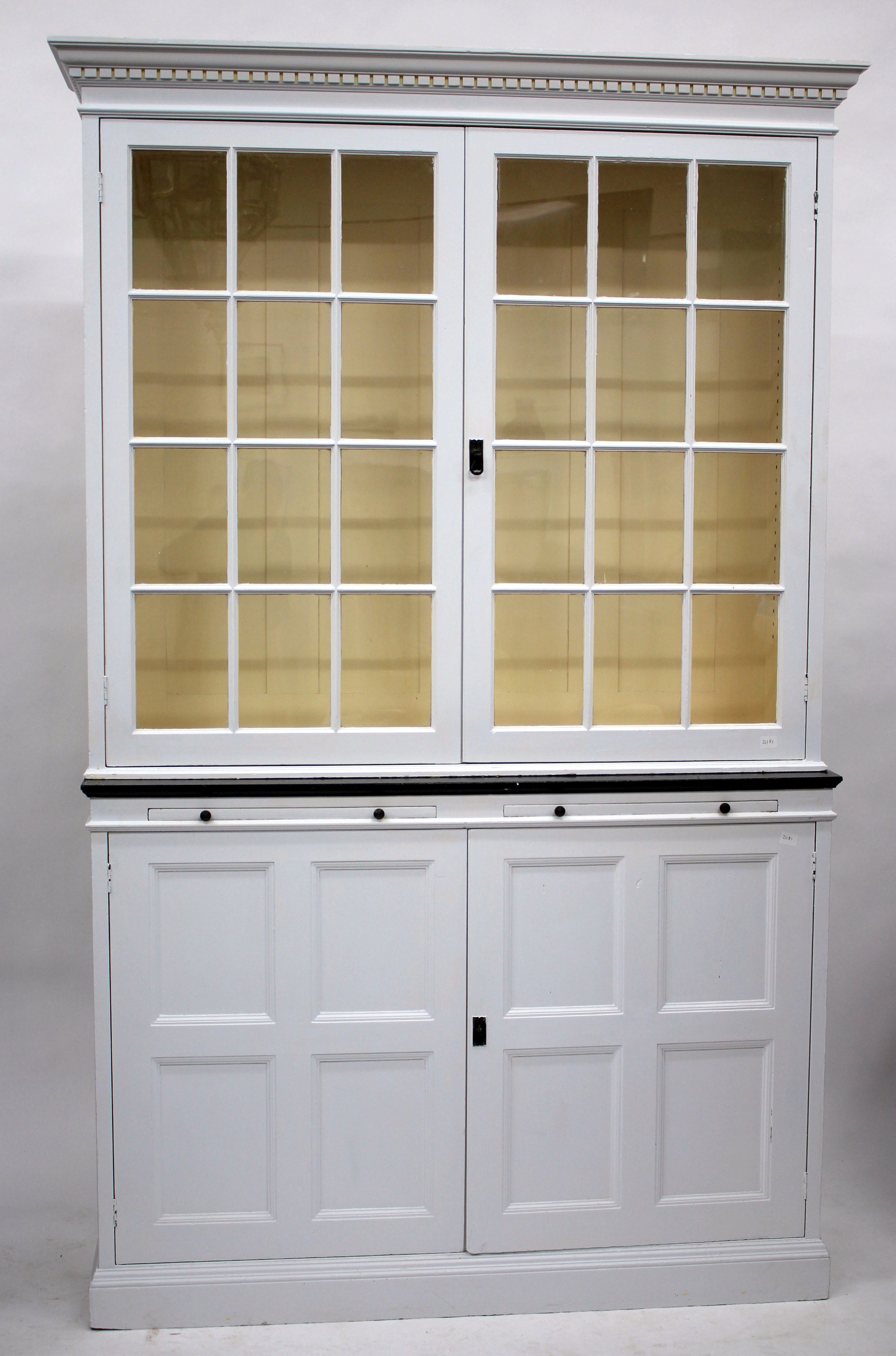 A 19TH CENTURY WHITE PAINTED CABINET with adjustable shelves and glazed doors above adjustable