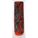 A 1960'S POOLE POTTERY VASE by Patricia Wells, of cylindrical form with orange ground and swirling