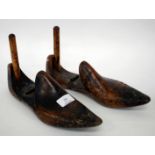 A PAIR OF 19TH CENTURY TREEN SHOE LASTS, each impressed with a leaf and diamond mark, 29cm in