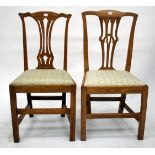 A SET OF SIX CHIPPENDALE STYLE LIGHT OAK DINING CHAIRS, each with a pierced and waisted splat,