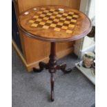 A VICTORIAN WALNUT AND TRIPOD GAMES TABLE, a circular top with a satinwood and rosewood inlaid chess