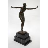 A CONTEMPORARY BRONZE SCULPTURE of a dancing girl on a stepped black marble base, overall 48cm in