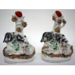 A PAIR OF 19TH CENTURY STAFFORDSHIRE POTTERY FLAT BACK VASES, each 13cm wide