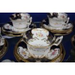 A COALPORT PORCELAIN TEA SERVICE consisting of thirty two pieces with bats wing and gilded