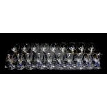 A SUITE OF VENETIAN GLASSWARE consisting of nine red wine glasses, the globular bowls engraved