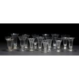 A GROUP OF FOURTEEN VARIOUS ANTIQUE SYLLABUB GLASSES, some moulded, some with cut decoration, all on