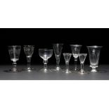 A GROUP OF VARIOUS 19TH CENTURY SMALL DRINKING GLASSES together with a syllabub glass, the tallest