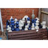 A LARGE POTTERY GARDEN CHESS SET the King 40cm in height