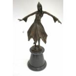 A CONTEMPORARY BRONZE SCULPTURE of an art deco style dancing girl on a turned marble socle base,