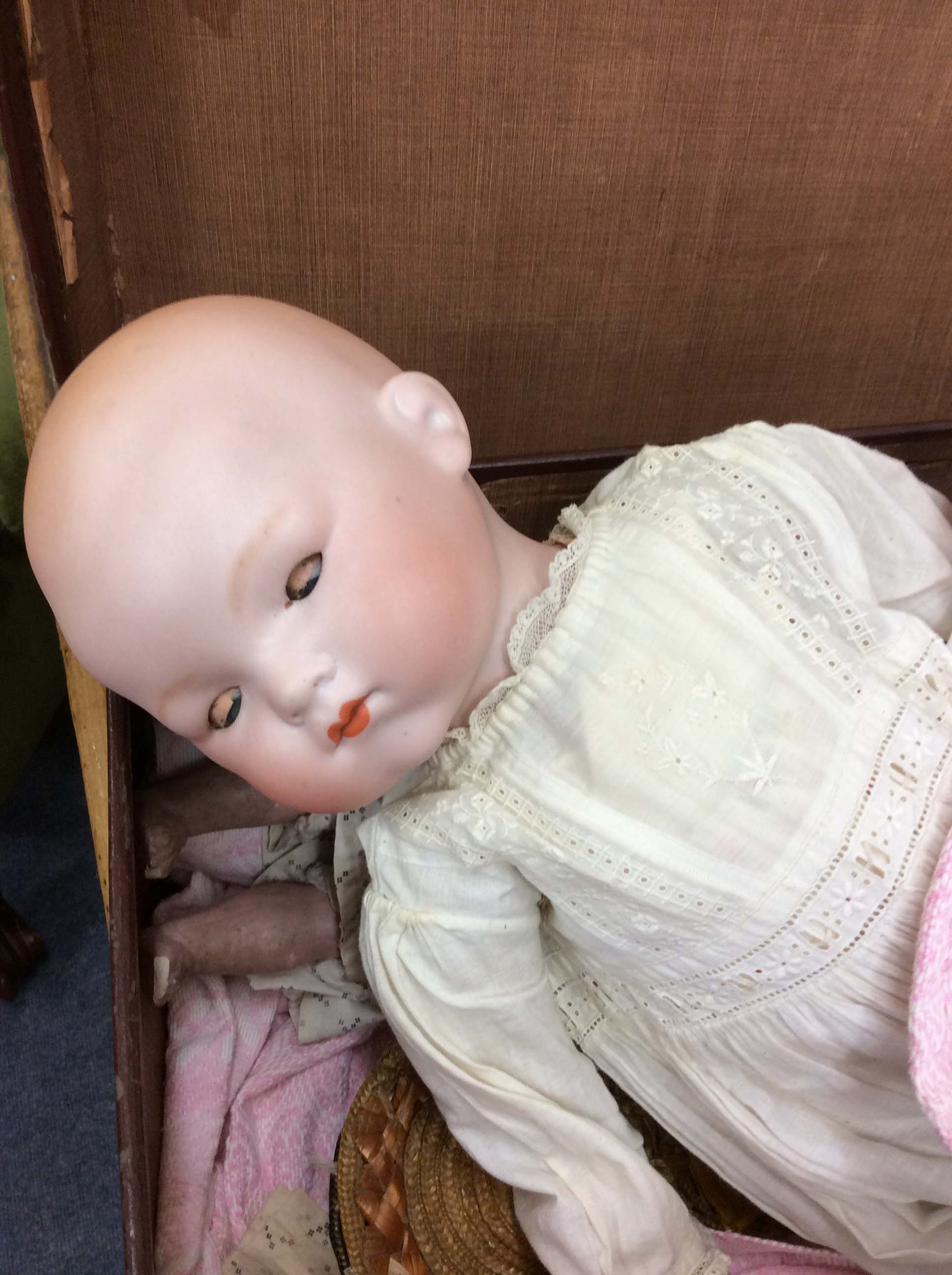 AN ANTIQUE GERMAN BISQUE HEAD DOLL 45cm in length and a further doll