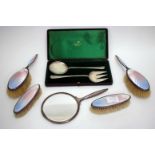 AN ART DECO ENAMELLED SILVER DRESSING TABLE SET with blue, pink and cream enamel, with marks for