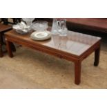 A CHINESE HARDWOOD LOW RECTANGULAR COFFEE TABLE, 127cm wide x 41cm high