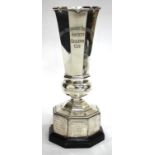 AN EARLY 20TH CENTURY SILVER TROPHY of octagonal vase form with marks for London 1929 and