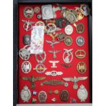A COLLECTION OF GERMAN RELATED MILITARY CAP BADGES to include a German Kriegsmarine badge marked SBW