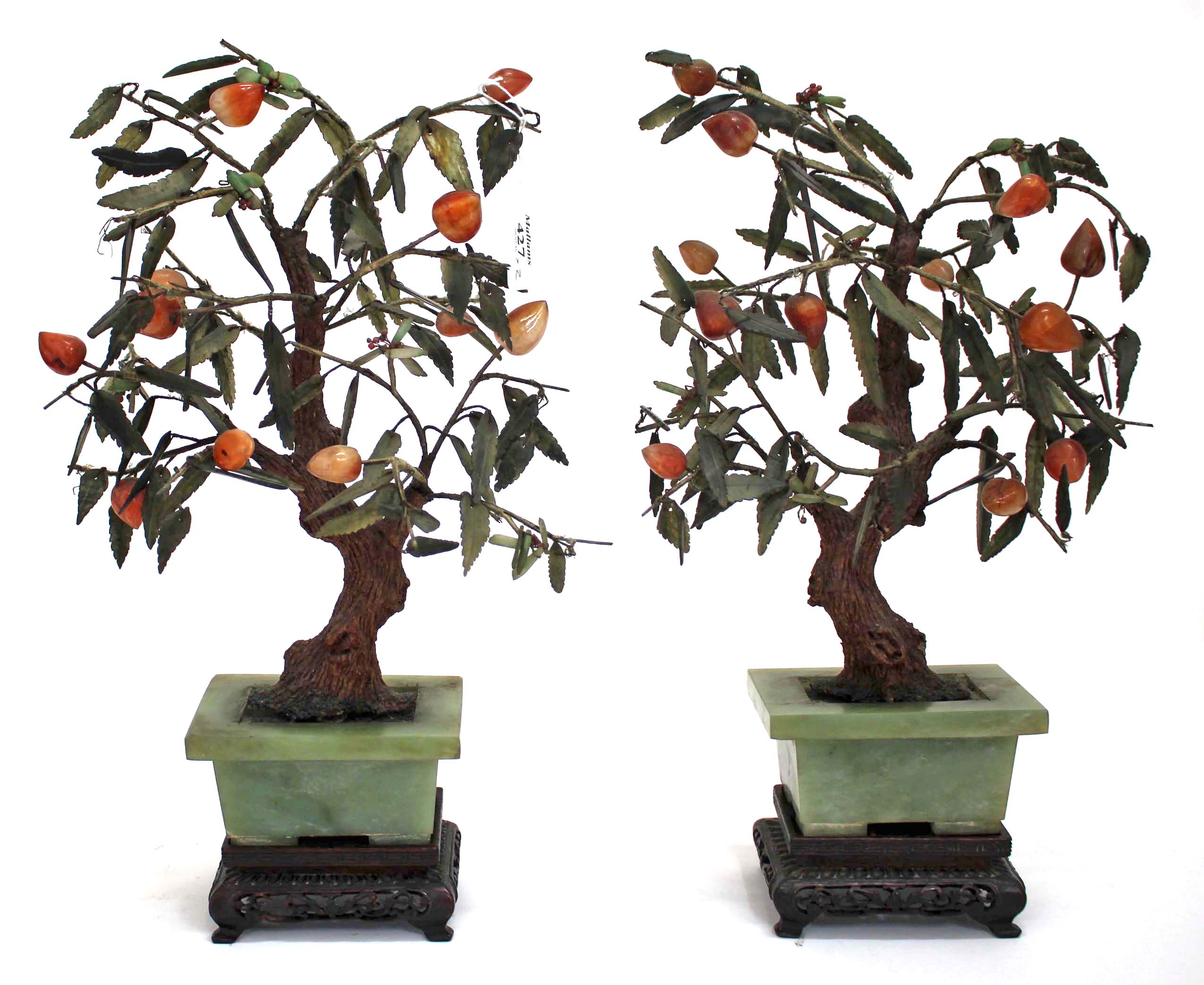 A PAIR OF MID 20TH CENTURY CHINESE HARDSTONE TREES each in rectangular jade planters with carved