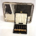 A FRENCH WHITE METAL RECTANGULAR TRAY, 31cm wide and a set of six silver coffee spoons